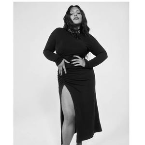 Zara black sheath dress with high slit.